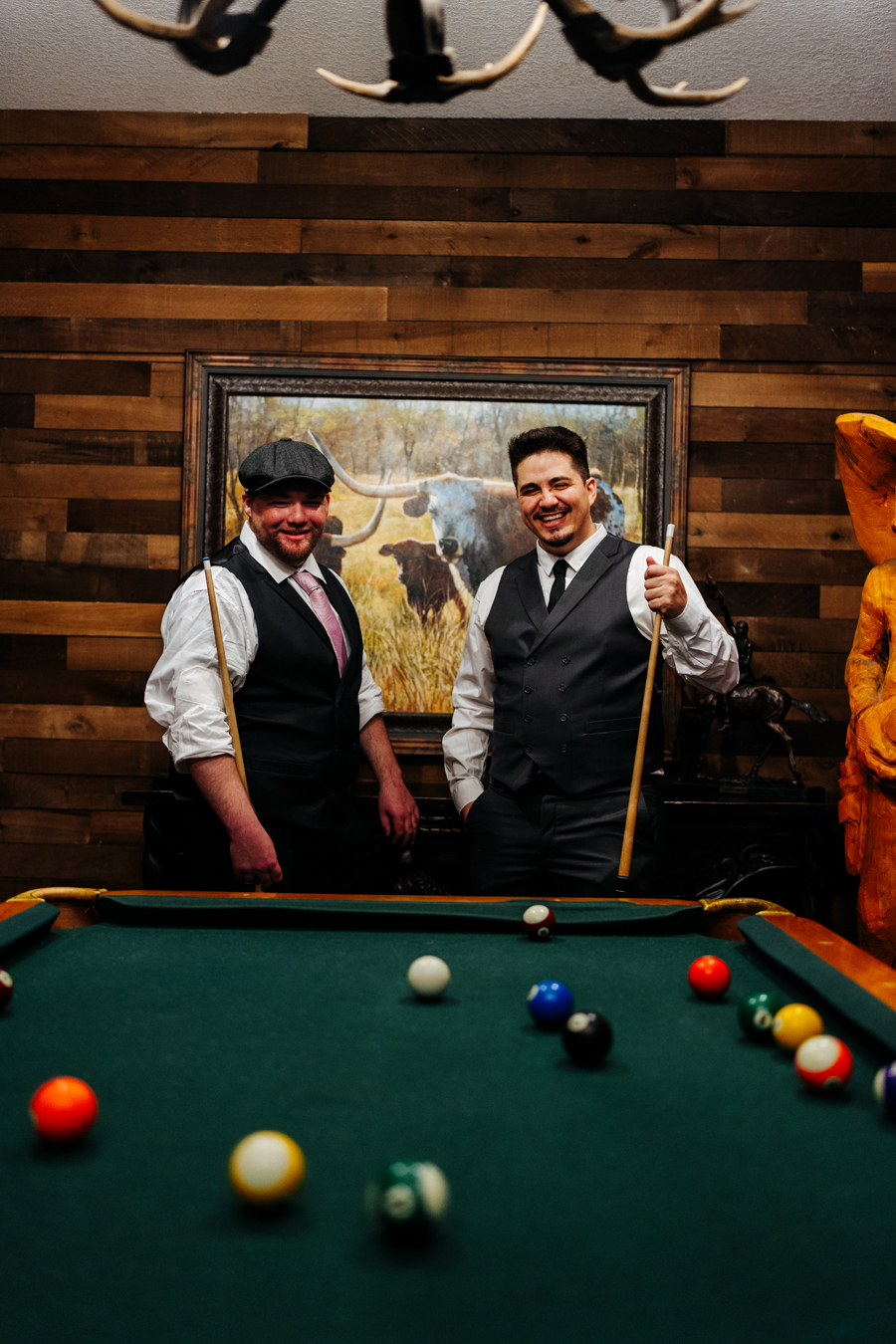 Groom and his best man hanging out before the wedding starts